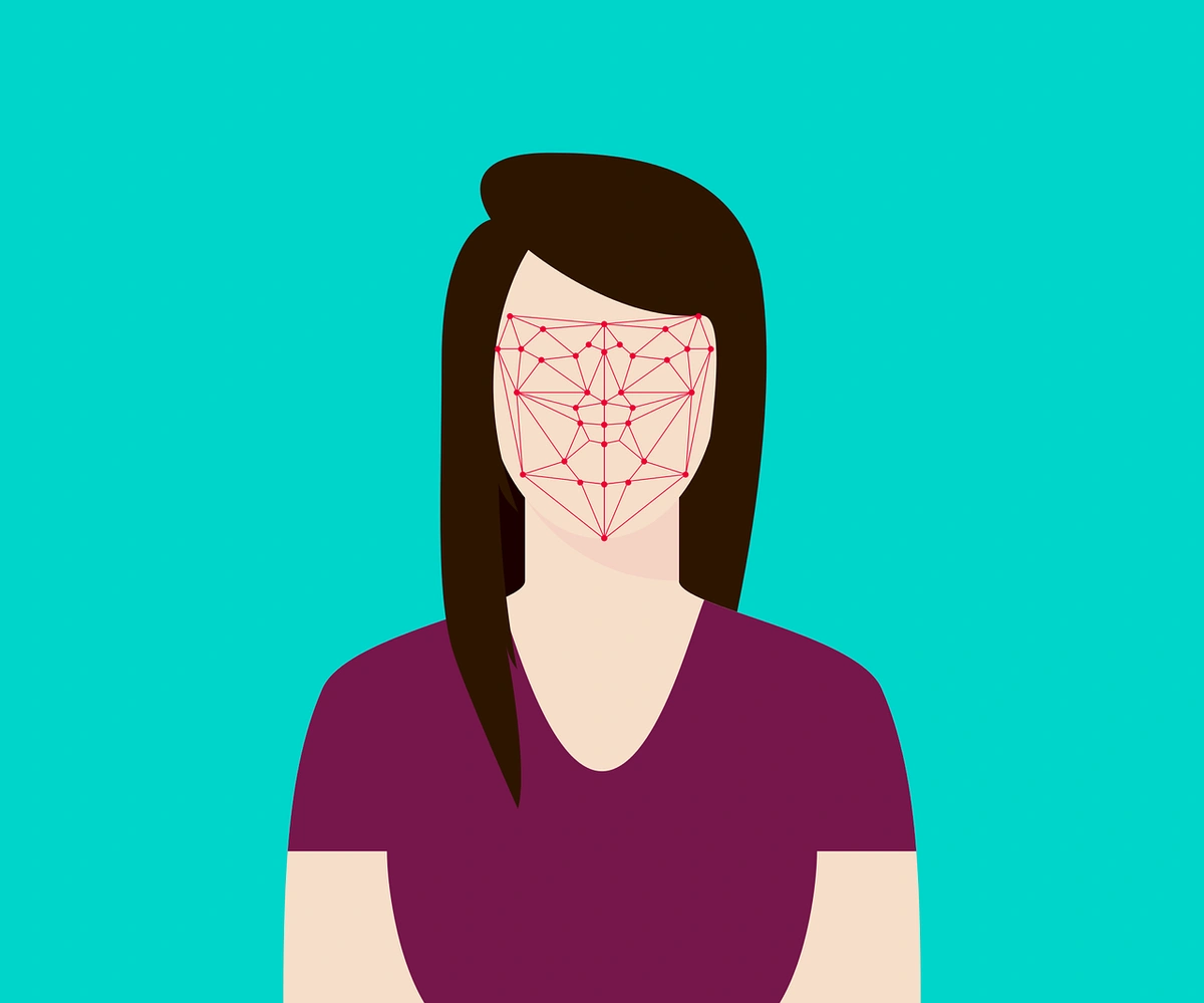 A person's face being scanned for facial recognition, illustrating the concept of biometric authentication